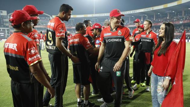 Preity Zinta greets Royal Challengers Bangalore players and Shane Watson after Kings X1 Punjab’s match against them at the Holkar Cricket Stadium in Indore on April 10. (BCCI/Sportzpics)