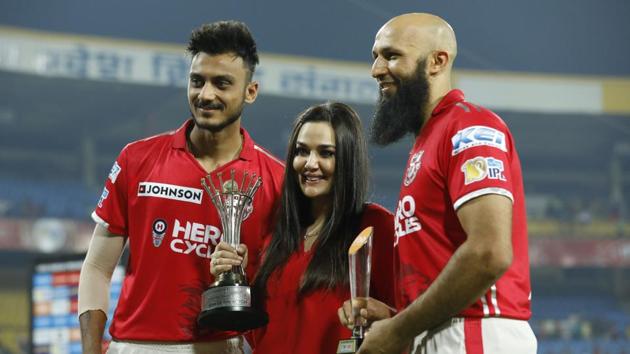 Preity Zinta with her team’s stars of the night -- Kings XI Punjab players Akshar Patel and Hashim Amla -- after the match against Royal Challengers Bangalore at the Holkar Cricket Stadium in Indore on April 10. (BCCI/Sportzpics)
