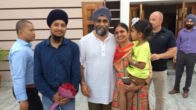 Sajjan greeting his relatives at his house in Bombeli village on Thursday. (HT Photo)