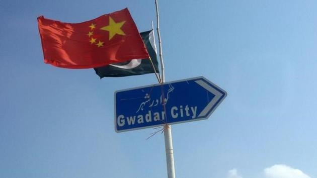 The Chinese and Pakistani flags fly on a sign along a road towards Gwadar, Pakistan. (Reuters) The Chinese and Pakistani flags fly on a sign along a road towards Gwadar, Pakistan. (Reuters)