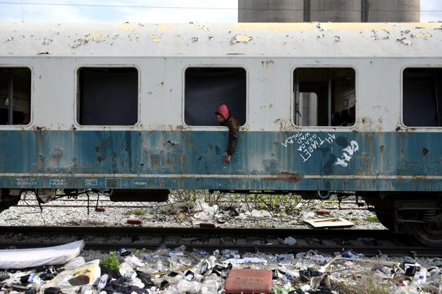 Habib, 22, from Algeria sits in an abandoned railway wagon used as a shelter by stranded migrants in the northern city of Thessaloniki, Greece. Habib arrived at the Greek island of Rhodes three months ago and he reached the mainland after hiding in a truck on a passenger ferry to Athens. (Alexandros Avramidis /Reuters) Habib, 22, from Algeria sits in an abandoned railway wagon used as a shelter by stranded migrants in the northern city of Thessaloniki, Greece. Habib arrived at the Greek island of Rhodes three months ago and he reached the mainland after hiding in a truck on a passenger ferry to Athens. (Alexandros Avramidis /Reuters)