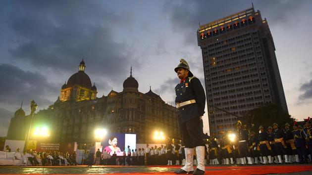 Fire-safety personnel during the closing parade of the fire service week at the Gateway of India on Thursday. (Pratik Chorge/HT Photo)