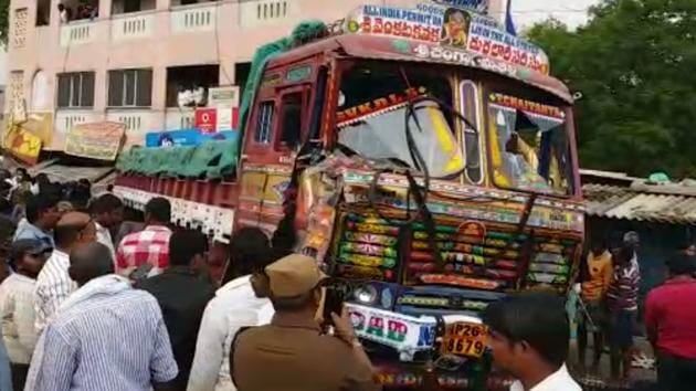 People near the truck that lost control and led to the tragedy that killed 20 people in Andhra Pradesh on Friday.(WhatsApp video grab)