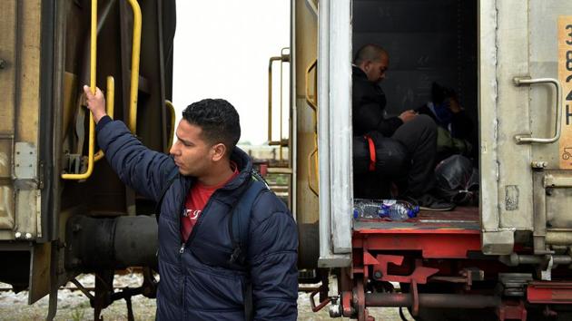 Mohamed Khaleuf from Morocco, stands next to a freight train before it departs.If they’re lucky, they make it across unnoticed. Some said they plan to get off before the border and continue on foot. Often, they are arrested by Macedonian guards and sent back to Greece. (Alexandros Avramidis /Reuters) Mohamed Khaleuf from Morocco, stands next to a freight train before it departs.If they’re lucky, they make it across unnoticed. Some said they plan to get off before the border and continue on foot. Often, they are arrested by Macedonian guards and sent back to Greece. (Alexandros Avramidis /Reuters)