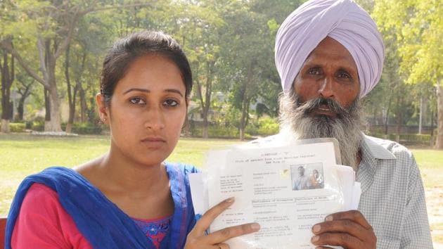 Rajwinder Kaur with her father Kulwinder Singh during a seminar in Chandigarh on Thursday.(Anil Dayal/HT Photo)
