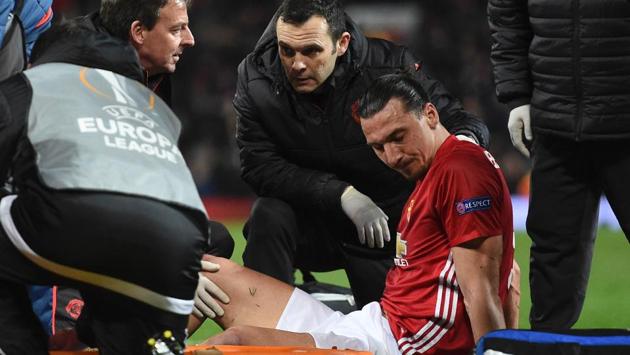 Manchester United's Swedish striker Zlatan Ibrahimovic gets treatment after injuring his knee during the UEFA Europa League quarter-final second leg clash against Anderlecht at Old Trafford in Manchester on Thursday. (AFP) Manchester United's Swedish striker Zlatan Ibrahimovic gets treatment after injuring his knee during the UEFA Europa League quarter-final second leg clash against Anderlecht at Old Trafford in Manchester on Thursday. (AFP)