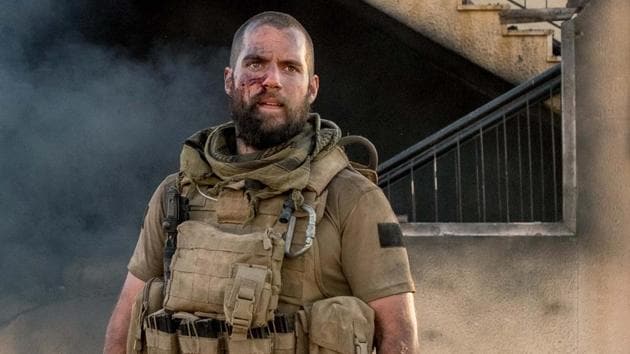 Sand Castle: With an impatiently done buzz cut, a beard that could, at some point, have been intended as a disguise, and a non-specific hillbilly accent, Cavill lumbers about, perpetually sweating, and barking orders in that same angry manner which confused so many Man of Steel fans.