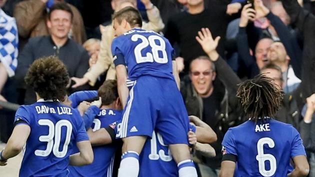 Chelsea Football Club's Nemanja Matic celebrates with teammates after scoring his side's fourth goal during the English FA Cup semifinal match against Tottenham Hotspur F.C. at Wembley stadium in London on Saturday. (AP) Chelsea Football Club's Nemanja Matic celebrates with teammates after scoring his side's fourth goal during the English FA Cup semifinal match against Tottenham Hotspur F.C. at Wembley stadium in London on Saturday. (AP)