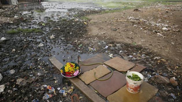 Clothes washing pile sits in a polluted field as world observes international Earth Day in Allahabad. (Rajesh Kumar Singh/AP) Clothes washing pile sits in a polluted field as world observes international Earth Day in Allahabad. (Rajesh Kumar Singh/AP)