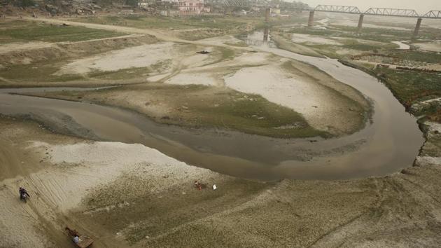 The dried up Ganga river basin at Sangam, winds through the confluence of the Ganges, Yamuna, and the mythical Saraswati River on the world Earth Day in Allahabad. (Rajesh Kumar Singh/AP) The dried up Ganga river basin at Sangam, winds through the confluence of the Ganges, Yamuna, and the mythical Saraswati River on the world Earth Day in Allahabad. (Rajesh Kumar Singh/AP)