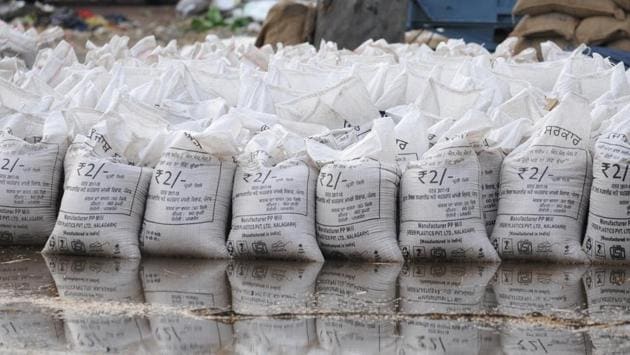 Drenched gunny bags containing wheat at the Jalandhar grain market on Saturday.   (Pardeep Pandit/HT) 