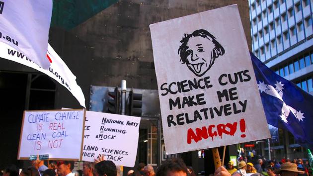Protesters hold placards and banners as they participate in the March for Science rally on Earth Day, in central Sydney, Australia. (David Gray/REUTERS) Protesters hold placards and banners as they participate in the March for Science rally on Earth Day, in central Sydney, Australia. (David Gray/REUTERS)