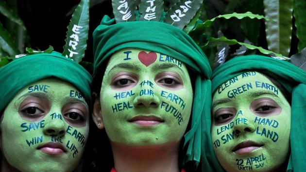 School girls with painted faces pose for a picture during 'Save Earth' awareness program on the eve of World Earth Day at a school in Moradabad, Uttar Pradesh. (PTI) School girls with painted faces pose for a picture during 'Save Earth' awareness program on the eve of World Earth Day at a school in Moradabad, Uttar Pradesh. (PTI)