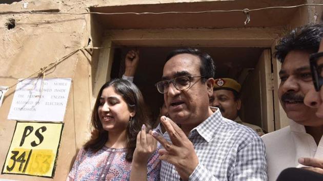 Congress leader Ajay Maken along with daughter Arushi at Rajouri Garden polling station. Elections to the three municipal corporations in Delhi took off around 8 am with Lieutenant Governor Anil Baijal being one of the first persons to be marked with the indelible ink at Masjid Moth polling booth in south Delhi. (Raj K Raj/HT Photo)