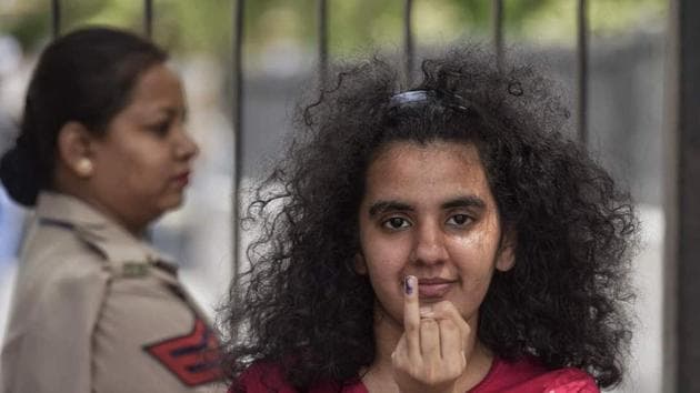First-time voter Deepali Rao after casting her vote at St Xavier’s School in north Delhi. She said she came back from London in time for the polls. (Ravi Choudhary/HT Photo)