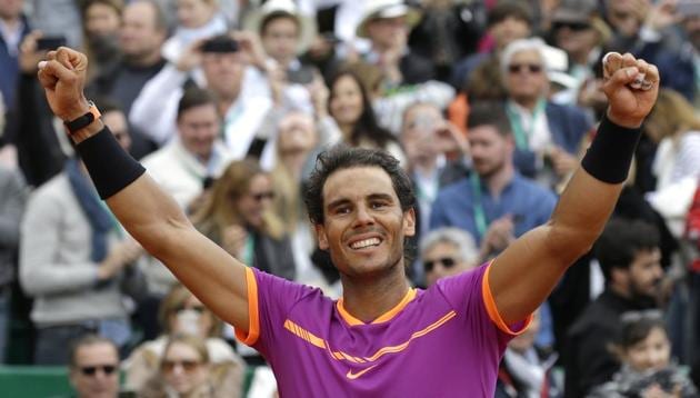 Spain's Rafael Nadal exults after winning his men's finals against Albert Ramos-Vinolas at the Monte Carlo Masters tennis tournament in Monaco on Sunday(AP)