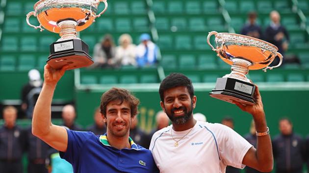 Rohan Bopanna of India and Pablo Cuevas of Uruguay with their trophies after their three-set victory over Feliciano Lopez and Marc Lopez of Spain in the doubles final of the Monte Carlo Masters on Sunday. (Getty Images) Rohan Bopanna of India and Pablo Cuevas of Uruguay with their trophies after their three-set victory over Feliciano Lopez and Marc Lopez of Spain in the doubles final of the Monte Carlo Masters on Sunday. (Getty Images)