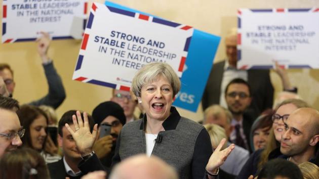 Britain's Prime Minster Theresa May delivers a stump speech at Netherton Conservative Club during the Conservative Party's election campaign, in Dudley on April 22, 2017. (Reuters) Britain's Prime Minster Theresa May delivers a stump speech at Netherton Conservative Club during the Conservative Party's election campaign, in Dudley on April 22, 2017. (Reuters)