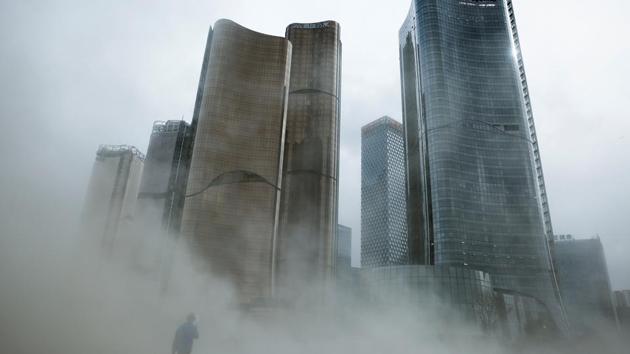 A man walks through a cloud of dust whipped up by wind at the construction site near newly erected office skyscrapers in Beijing on April 20, 2017. (Thomas Peter/REUTERS) A man walks through a cloud of dust whipped up by wind at the construction site near newly erected office skyscrapers in Beijing on April 20, 2017. (Thomas Peter/REUTERS)