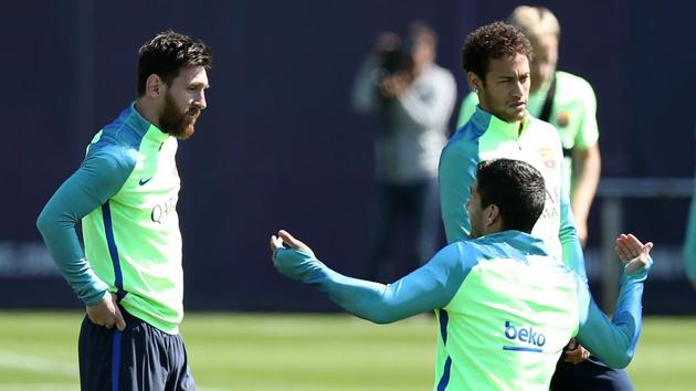 Barcelona's Lionel Messi, Neymar and Luis Suarez speak during a training session on the eve of their El Clasico clash against bitter rivals Real Madrid in the La Liga. REUTERS/Albert Gea (REUTERS) Barcelona's Lionel Messi, Neymar and Luis Suarez speak during a training session on the eve of their El Clasico clash against bitter rivals Real Madrid in the La Liga. REUTERS/Albert Gea (REUTERS)