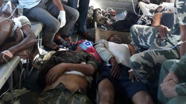 The injured CRPF jawans of the 74th battalion being shifted to a hospital in Raipur on Monday.(HT Photo)