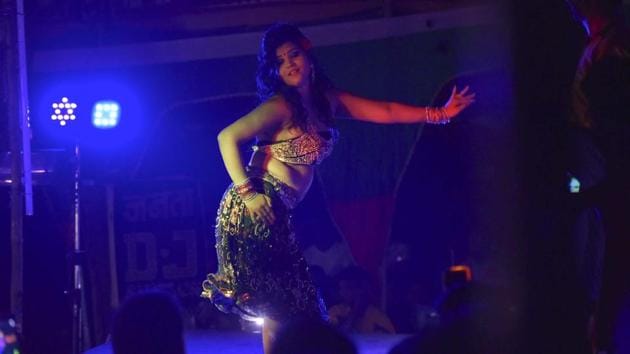 Live dancer and actor in Bhojpuri films, Pooja Singh Rajput, dancing at a wedding in Aara. Tall and pretty, 26-year-old Pooja is married to the owner of a local orchestra group Ram Kumar Pandey. She says, that one moment, he is her husband and the next, he is an agent for whom she just a woman who is supposed to dance dirty before raucous men to help him make a quick buck. (Ravi Choudhary/HT PHOTO)