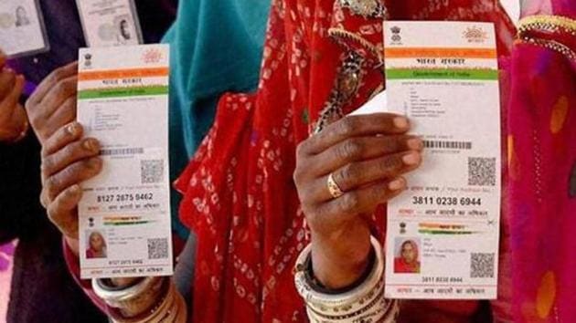 Women in Rasjasthan showing their respective Aadhaar cards.(PTI File Photo)