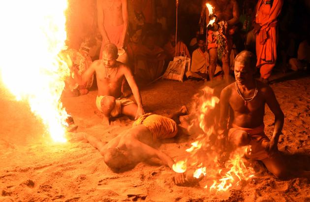 Every year in April, a little known folk dance dating back to the 8th century takes place in Southern Odisha at Ganjam where devotees undergo penance after obtaining permission from Lord Shiva. They begin to go through the physical torture – ‘Danda’ (Penance) along with rituals stretching for a number of days before Goddess Kali. The devotees also perform dance and narrate the sufferings in order to wash away their sins by pleasing the goddess. (Arabinda Mahapatra / HT Photo)