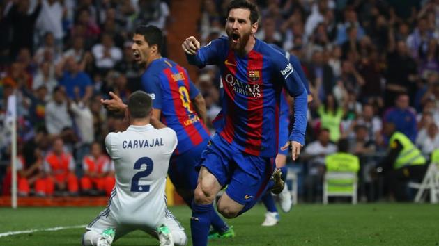 Lionel Messi celebrates after scoring Barcelona’s winning goal against Real Madrid in El Clasico in La Liga.(REUTERS)