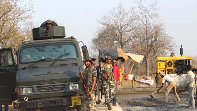 A CRPF road opening party at the Chhattisgarh ambush site where Maoists killed 12 personnel in March.(HT Photo)