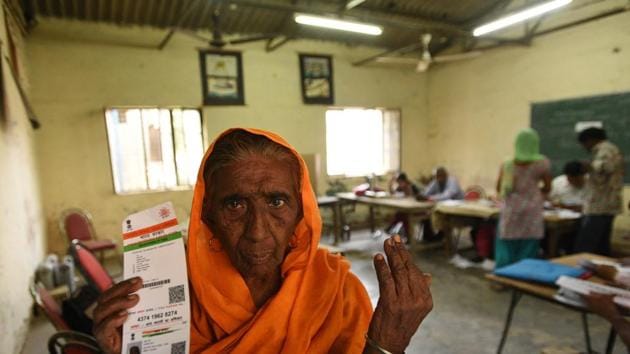 76 year-old Saheb Kaur poses for a picture after casting her vote at Kalyan Puri polling station.(Ravi Choudhary/HT PHOTO)