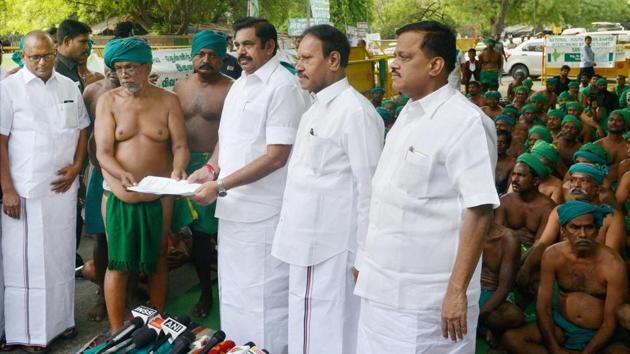 Tamil Nadu chief minister Edappadi Palaniswami receiving a memorandum from the state’s farmers who had been protesting for the last 39 days , at Jantar Mantar in New Delhi, April 23. (PTI) Tamil Nadu chief minister Edappadi Palaniswami receiving a memorandum from the state’s farmers who had been protesting for the last 39 days , at Jantar Mantar in New Delhi, April 23. (PTI)