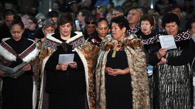 Te Wairua Tapu Choir from New Zealand sing 'Song of Sorrow', in Maori language, during the Anzac Day Dawn Service in Sydney. (Saeed Khan/AFP)