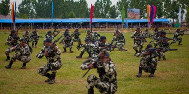 Commandos of Central Reserve Police Force show their skills after their graduation ceremony on the outskirts of Srinagar. (Getty Images) Commandos of Central Reserve Police Force show their skills after their graduation ceremony on the outskirts of Srinagar. (Getty Images)
