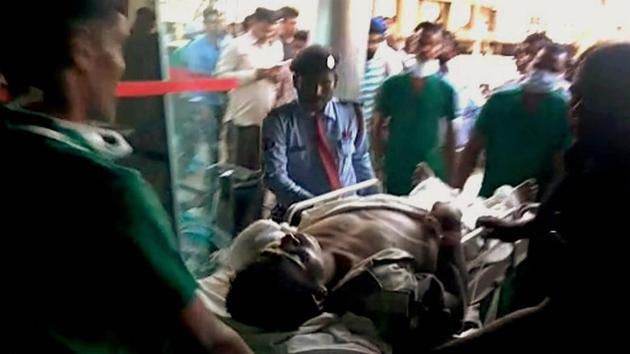 An injured CRPF jawan is being taken to Raipur for treatment following a Maoist attack at Burkapal near Chintagufa in Chattisgarh on Monday.(PTI Photo)