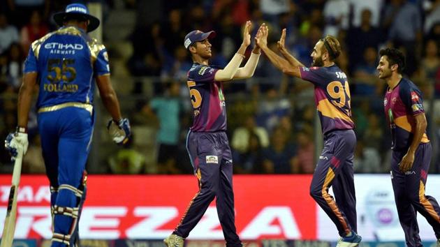 Mumbai: Rising Pune Supergiants’ players celebrate the dismissal of Kieron Pollard. (PTI)