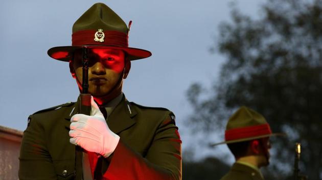New Zealand military stand at attention at the cenotaph during the ANZAC Day dawn service in Christchurch, New Zealand. ANZAC Day is held annually commemorating the April 25, 1915, landings in Gallipoli, the first major military action fought by the Australian and New Zealand Army Corps during World War I. (Mark Baker/AP)