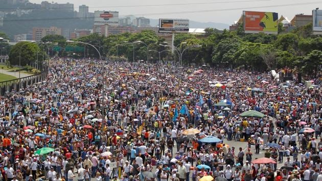 The population is suffering shortages of food, medicine and basic supplies. Riots and looting have occurred in several places. (Christian Veron/REUTERS) The population is suffering shortages of food, medicine and basic supplies. Riots and looting have occurred in several places. (Christian Veron/REUTERS)