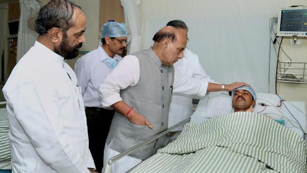 Union home minister Rajnath Singh enquires about the health of injured CRPF personnel at the Ramkrishna Care Hospital in Raipur ,on Tuesday. (PTI) Union home minister Rajnath Singh enquires about the health of injured CRPF personnel at the Ramkrishna Care Hospital in Raipur ,on Tuesday. (PTI)