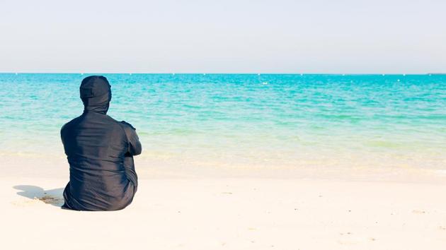 A burkini-clad woman by the beach. Cannes might see them in May when the festival begins. (Shutterstock) A burkini-clad woman by the beach. Cannes might see them in May when the festival begins. (Shutterstock)