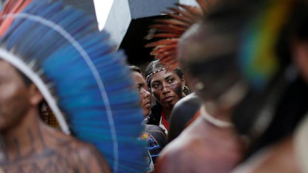 The clashes ended around dusk. Some indigenous people suffered light injuries. There was no immediate word whether any officers were hurt. (Ueslei Marcelino/REUTERS)