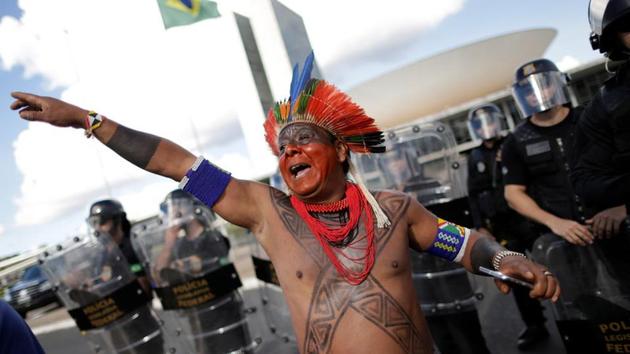 He said an arrow struck a police bag but no officers were hurt. (Ueslei Marcelino/REUTERS)