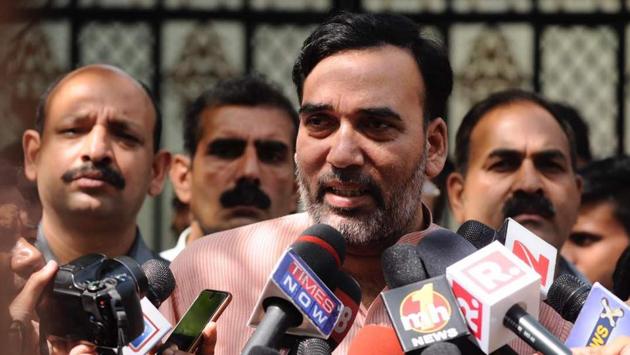Gopal Rai speaks to media outside Kejriwal's residence. The AAP and the Congress were in a close race for the second slot. (Burhaan Kinu/HT Photo)
