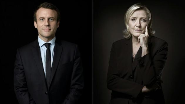 French presidential election candidate for the En Marche ! movement Emmanuel Macron (L) and candidate for the far-Right Front National (FN) party Marine Le Pen.