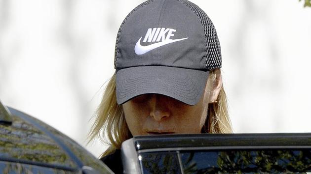 Maria Sharapova gets into a car in Stuttgart on Monday, April 24. After the end of her 15-month doping suspension, Maria Sharapova will play at the Porsche Grand Prix tennis tournament in Stuttgart this week. (AP) Maria Sharapova gets into a car in Stuttgart on Monday, April 24. After the end of her 15-month doping suspension, Maria Sharapova will play at the Porsche Grand Prix tennis tournament in Stuttgart this week. (AP)