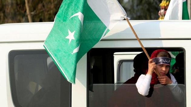 A girl holds a Pakistani flag during a rally. (Reuters) A girl holds a Pakistani flag during a rally. (Reuters)