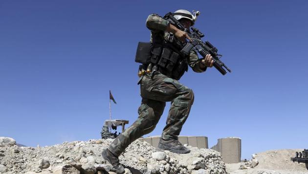 A commando during an operation in Achin district of Jalalabad in Afghanistan.(AP)