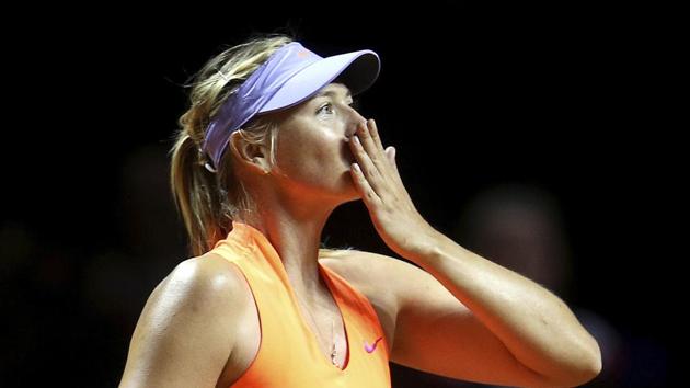 Maria Sharapova blows a kiss after winning 7-5, 6-3 against Roberta Vinci at the Porsche Tennis Grand Prix in Stuttgart, Germany on Wednesday. It was Sharapova's first match after a 15-month doping ban. (AP)