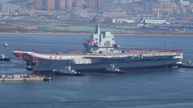 China's first domestically-built aircraft carrier is seen during its launching ceremony in Dalian, Liaoning province.(Reuters Photo) China's first domestically-built aircraft carrier is seen during its launching ceremony in Dalian, Liaoning province.(Reuters Photo)