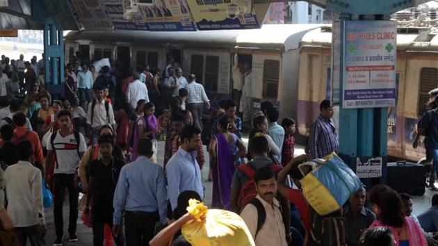 People at Kalyan station wait for trains to resume.(Rishikesh Choudhary/ HT Photo) People at Kalyan station wait for trains to resume.(Rishikesh Choudhary/ HT Photo)